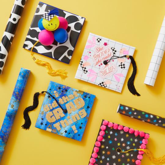 Decorated Graduation caps on a yellow background