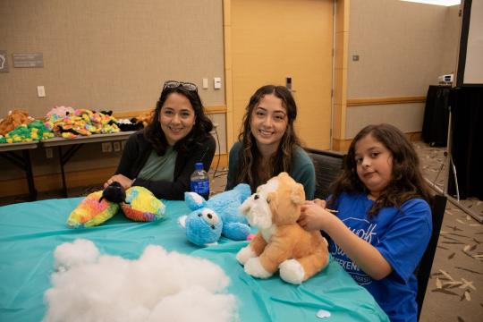 Students building a bear