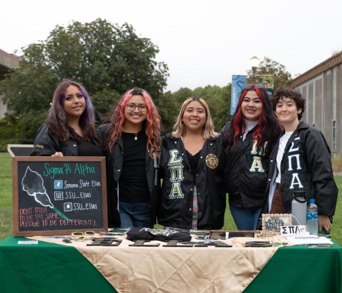sigma pi alpha members tabling