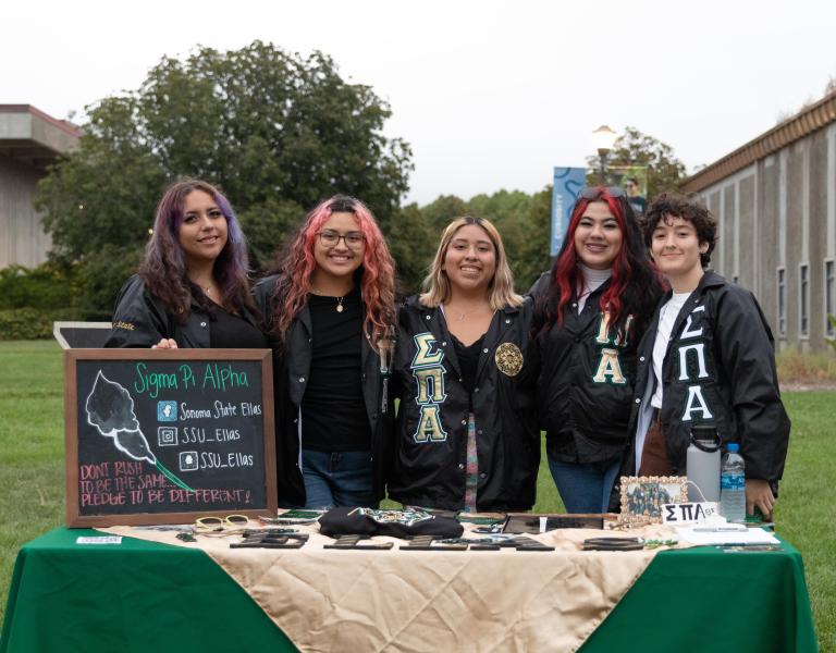 sigma pi alpha members tabling