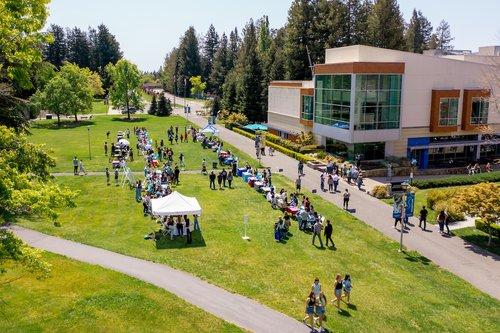 an outdoor tabling event viewed from above