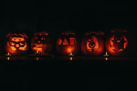 line of carved pumpkins