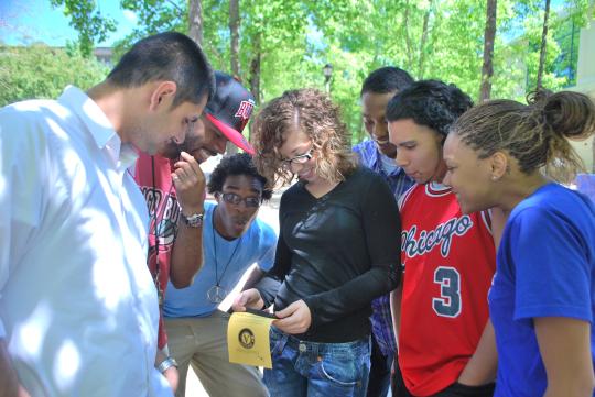 group of SSU students looking at a pamphlet