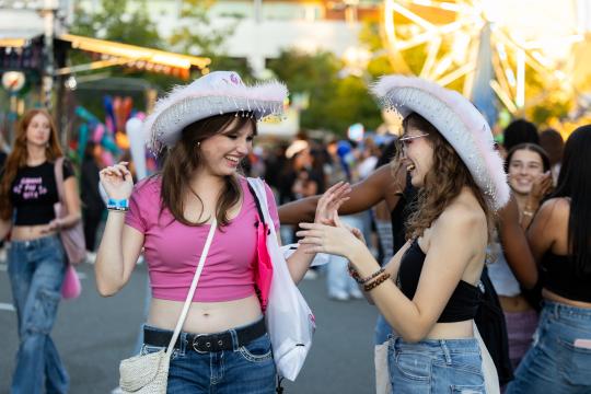 2 students with cowgirl hats.jpg