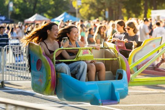 Students on a ride at big nite